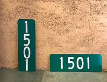 Vertical and Horizontal green reflective address signs