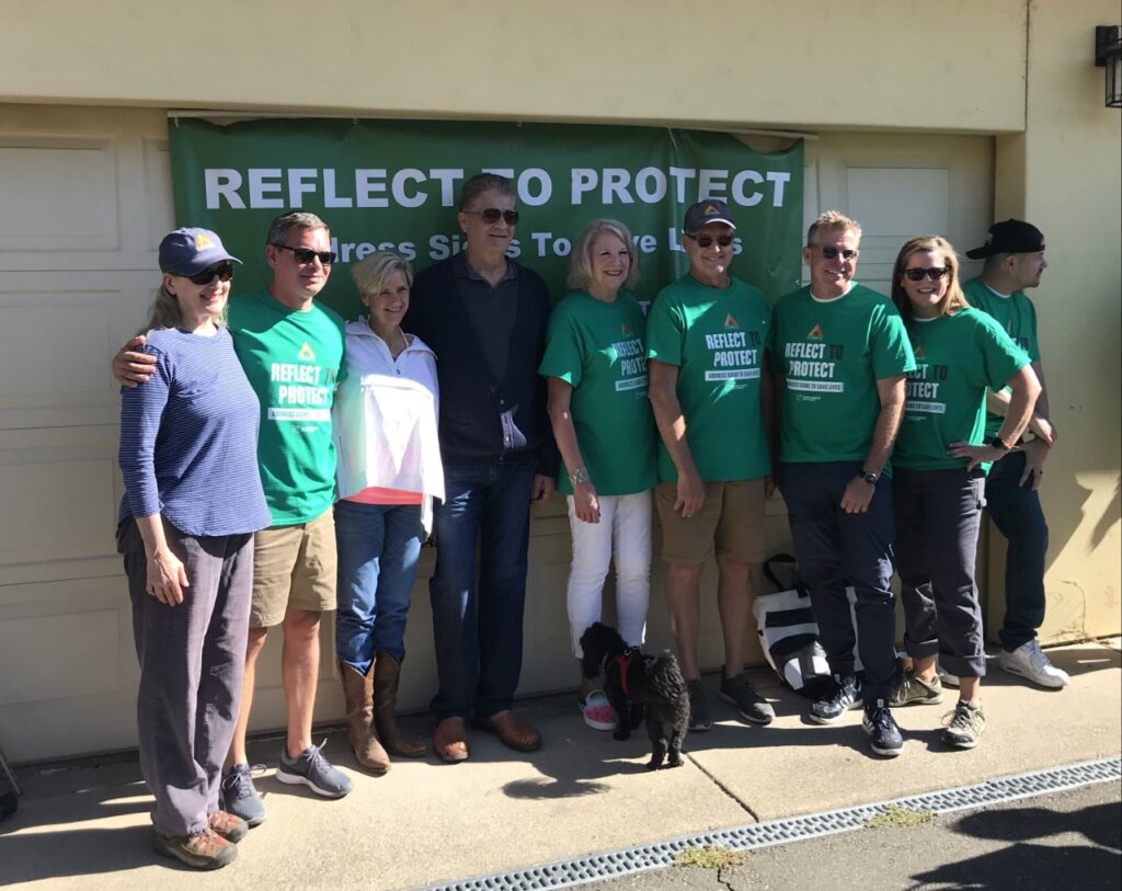 Small group of Volunteers in green t-shirts 